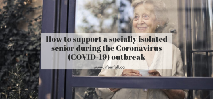 socially isolated senior looking out the window with a cup of tea during COVID-19 outbreak